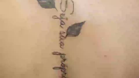 Tattoo costas feminina