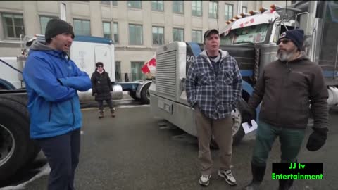 Supporters of the Freedom Convoy provide food and drink to the sit-in in the center of the capital