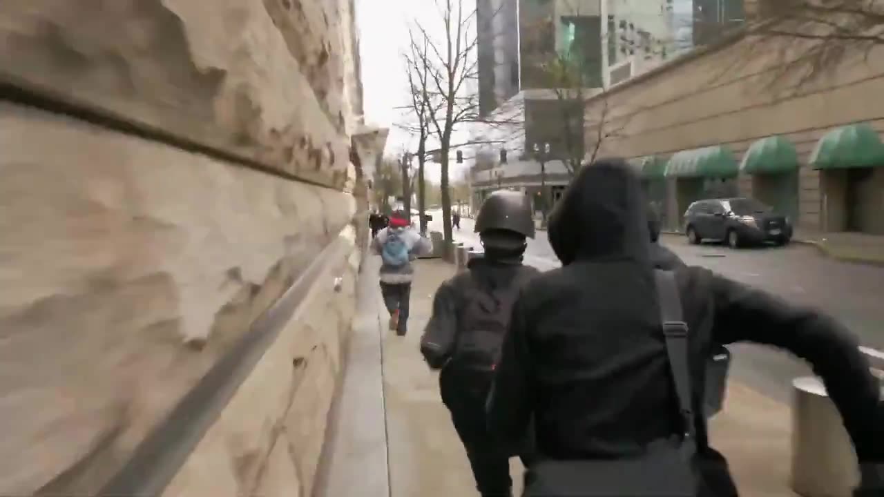 Feb 8 2020 Portland 1.3 antifa throw things and follow A videographer named andy 3