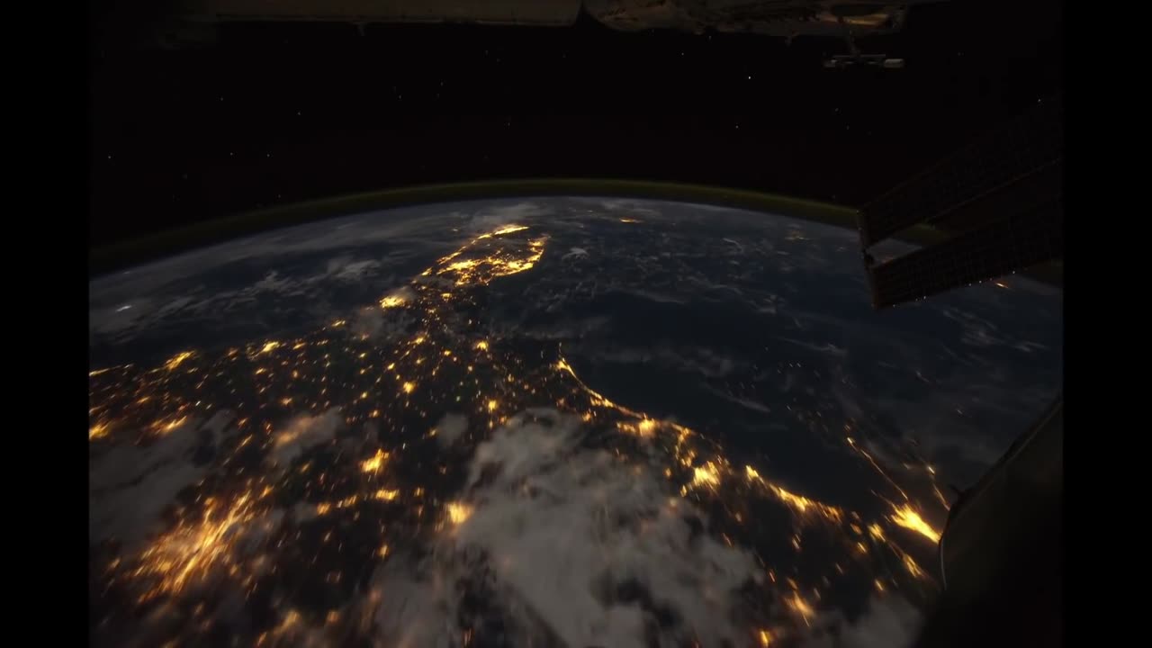 All alone in the night time lapse footage of the earth ad seen from the iss