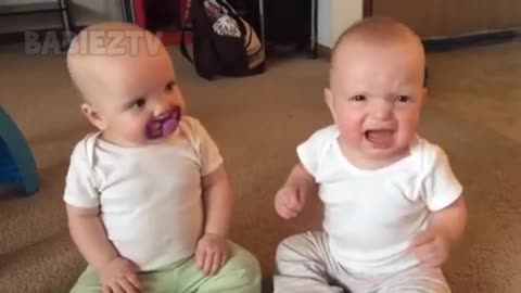 Funniest TWIN Baby Girls Fighting Over Pacifier