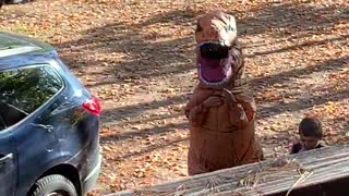 T-Rex Greets Kids School Bus