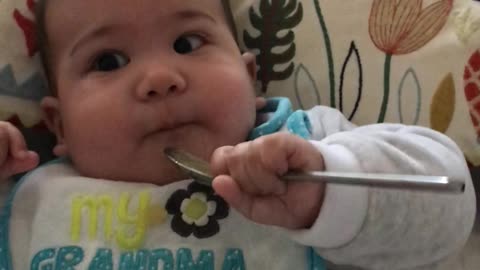 Adorable infant baby super hungry: give me more!