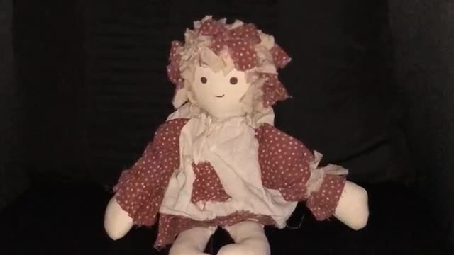 Active haunted doll