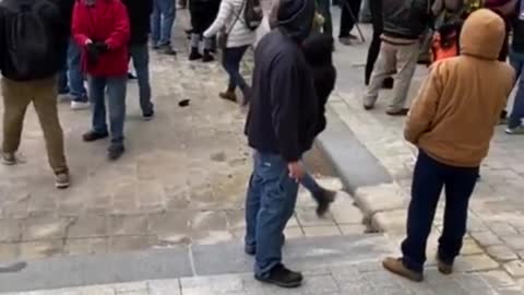 A Pro-Trump MAGA demonstrator ask Capitol Police to intervene against violent instigators