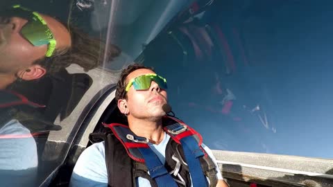 Stunt Pilot Snacks on Pizza