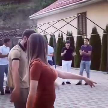 A GIRL DANCES A CHECHEN LEZGINKA AT A WEDDING