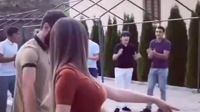 A GIRL DANCES A CHECHEN LEZGINKA AT A WEDDING