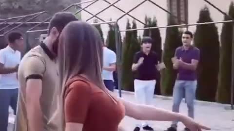A GIRL DANCES A CHECHEN LEZGINKA AT A WEDDING