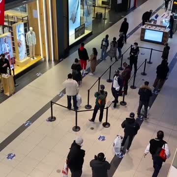 Nike store line at Toronto's Eaton Centre on reopening day