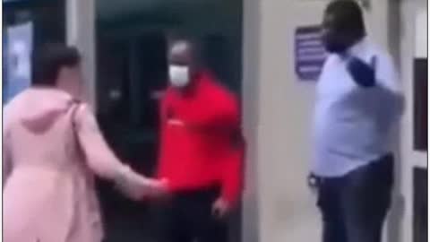 French lady tries to get in the grocery store but armed guards prevent her from going in