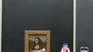 Lib Activist Pulls DERANGED Stunt, Wipes Cake On The Mona Lisa