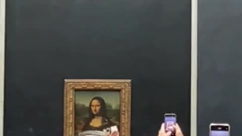 Lib Activist Pulls DERANGED Stunt, Wipes Cake On The Mona Lisa