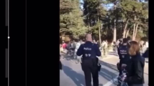 Belgium takes masks off, bicycle protest.