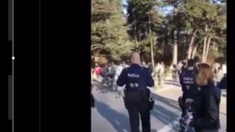 Belgium takes masks off, bicycle protest.