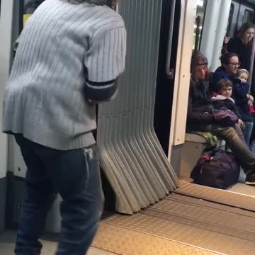 Old guy puts down satchel bag and starts dancing in subway
