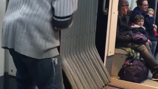 Old guy puts down satchel bag and starts dancing in subway