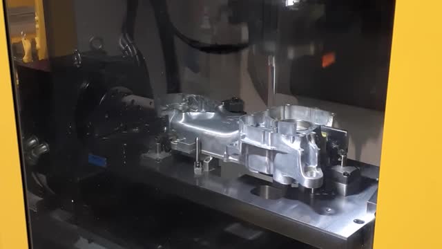 High speed FANUC RoboDrill making swiss cheese