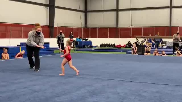 Inspirational Heartland Gymnastics coach and gymnast duo