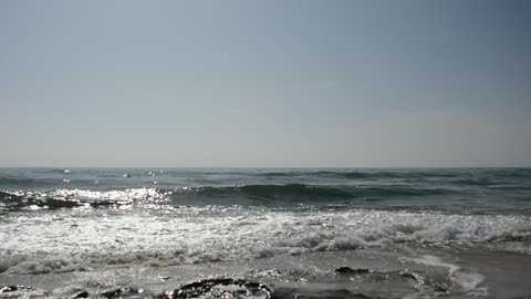 the beauty of the sea and the waves in the sun