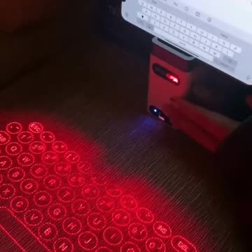 Bluetooth virtual keyboard with a phone stand