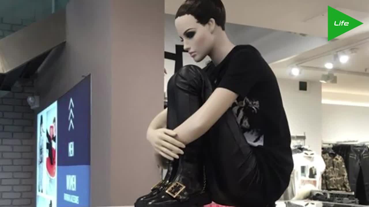 Shoppers react to sad-looking mannequins placed throughout mall