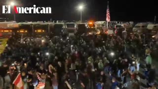 NOW: Thousands in attendance as people wave 50x150ft. American Flag in Indianapolis IN rally