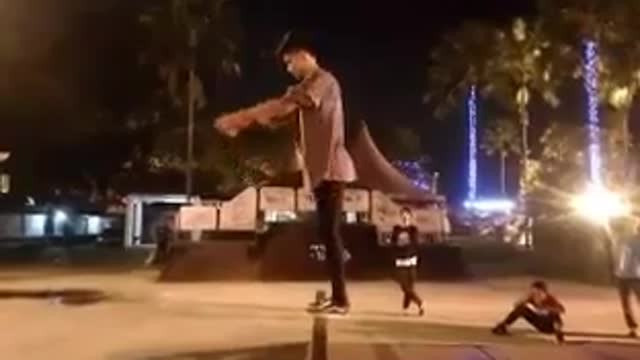 Guy dark sweater backflip fail