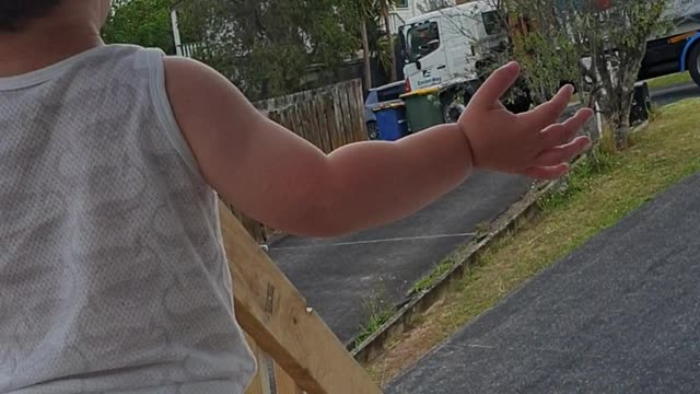 Toddler Gets Super Excited For The Garbage Truck