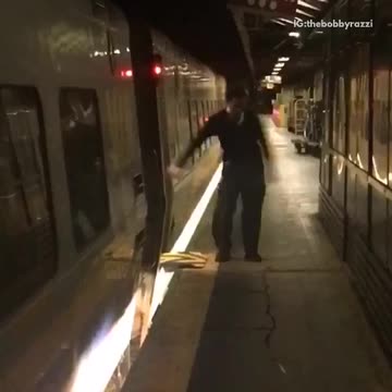 Guy doing the floss dance on subway platform