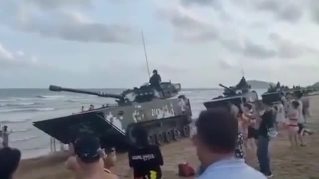 Chinas Military tanks deployed at Xiamen City beaches nearer to Taiwan Strait in Fujian .