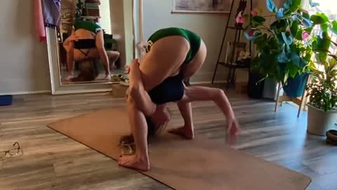 Hot Yoga Practice With Inversions, Forward Folding and Legs Behind Head