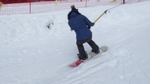 Learning Snowboarders Struggle on to Stay on Lift