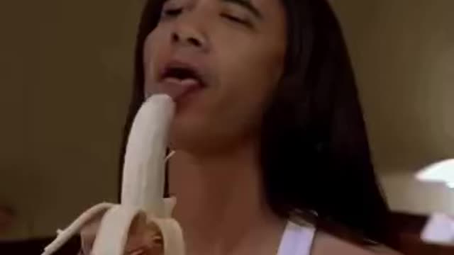 A banana being enjoyed with joy