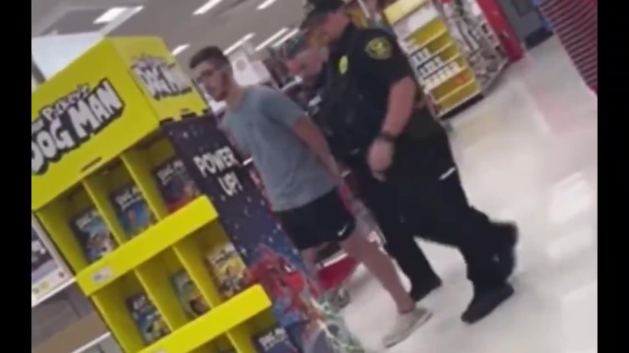 Guy gets caught video taping under a woman's dress