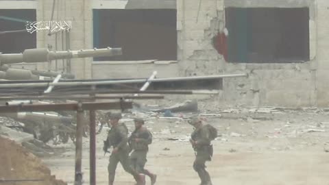 A Zionist soldier sniper south of the Al-Zaytoun neighborhood in Gaza City