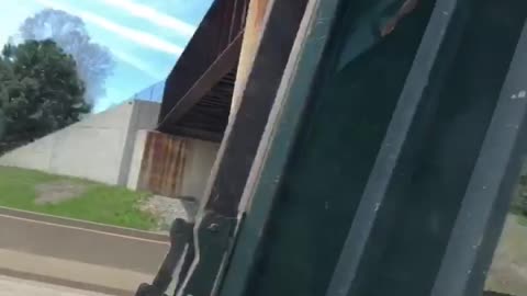 Bridge Beats Dump Truck