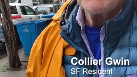 Man harshly spraying water on a homeless woman