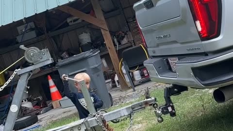 Son Helps Dad With Trailer