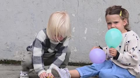 GIRLS PLAYING WITH BALL