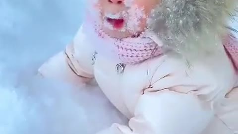 Baby's in snowfall