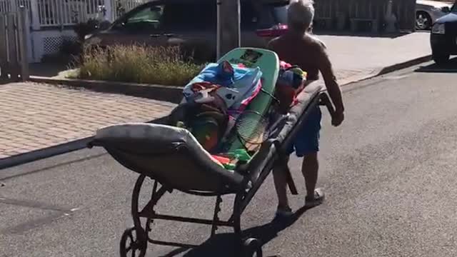 Man uses mattress to move boogie boards