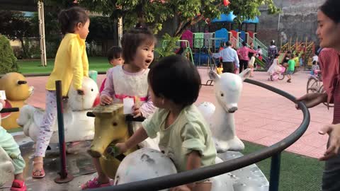 Children playing in the amusement park