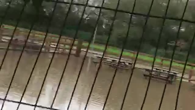 THIS PUB GARDEN IS FLOODED, HAD TO CLOSE DOWN THE PUB