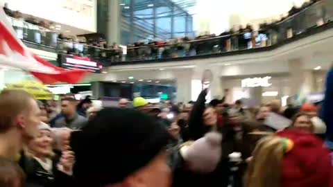 International solidarity in Manchester: Crowds wave Canadian and Australian flags