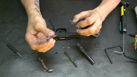 Johnny recives RECOIL writer Tom Marshall's Glock for a custom group EDUCATIONAL ONLY