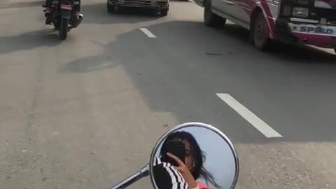 Viral couple ride almost accident