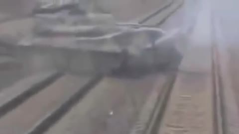 Video of Russian BMP-3 crossing in front of a Ukrainian train from the beginning of the war