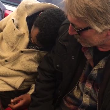Stranger falls asleep on man's shoulder on bus ride