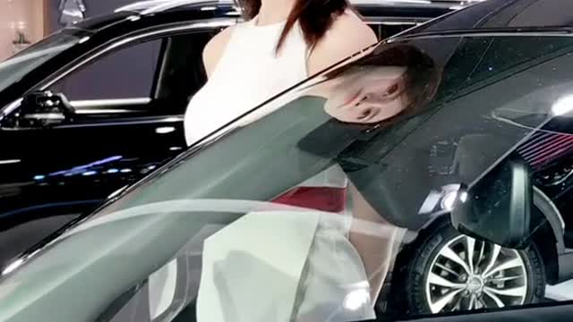 Black car and Asian female model